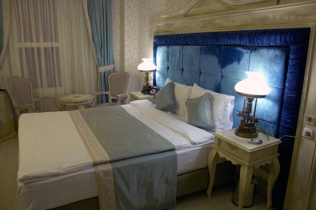 Trilyali Butik Hotel Tirilye الغرفة الصورة
